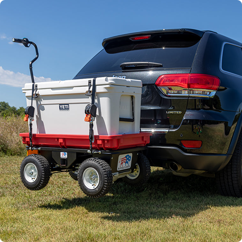 YETI cooler strapped on Buffalo Cart behind Jeep